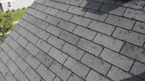 hail damage on a shingle roof after a storm